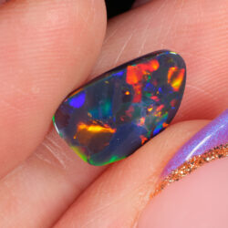1.46ct Natural Black Opal - Freeform Multicolor Fire-hand shot