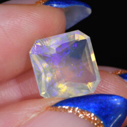 3.91ct Natural Faceted Crystal Opal-hand shot